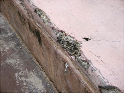 Figure 21. The forced removal of skate stoppers, have rendered the ledge un-skateable.